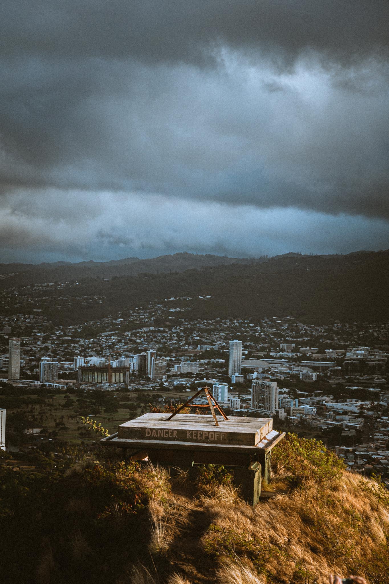 DANGER KEEPOFF bunker above the Honolulu skyline