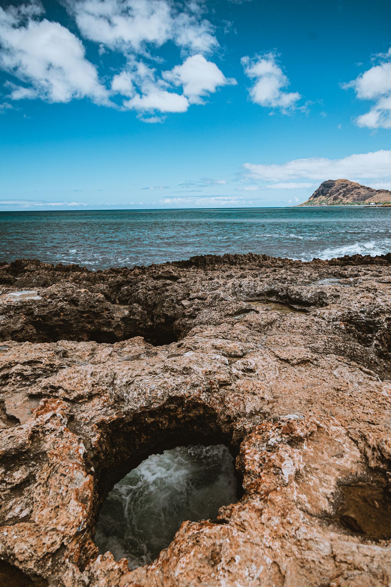 Natural hole in the rock shelf